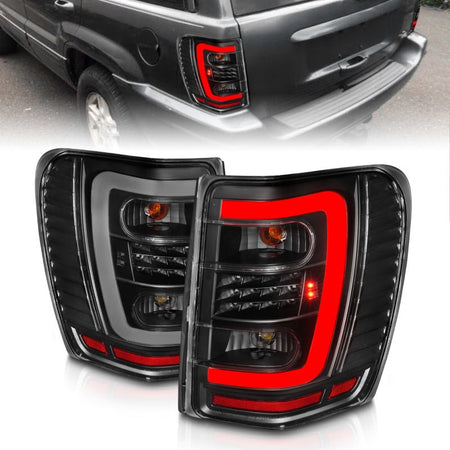 ANZO 1999 - 2004 Jeep Grand Cherokee LED Tail Lights w/ Light Bar Black Housing Clear Lens - CPC Performance