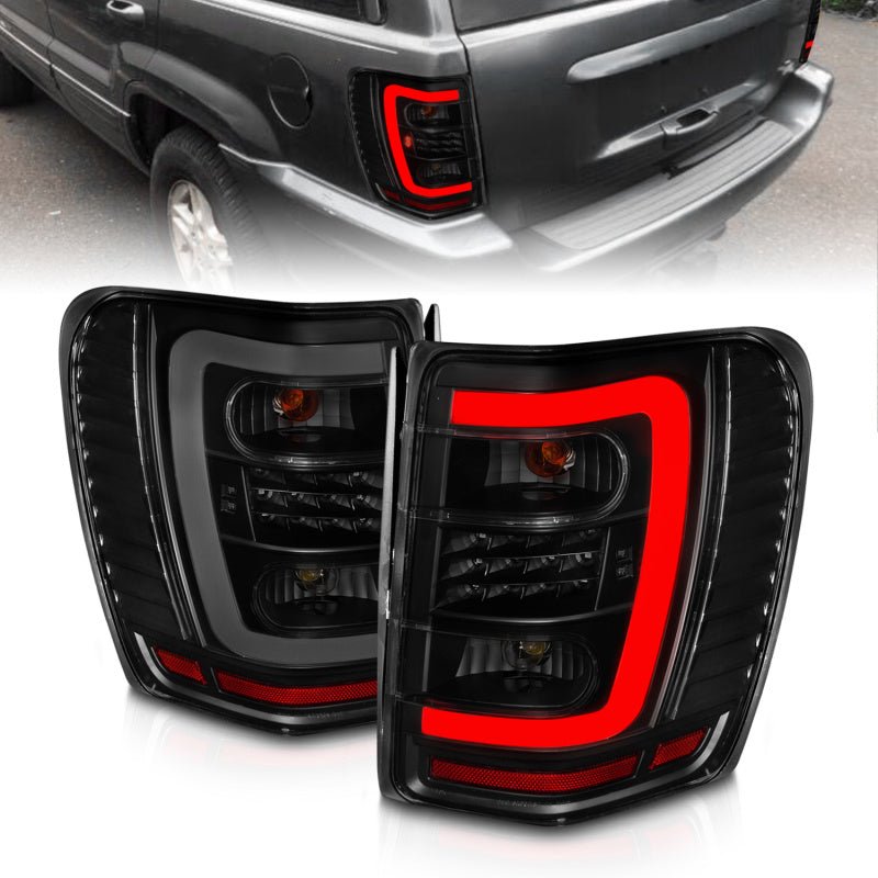 ANZO 1999 - 2004 Jeep Grand Cherokee LED Tail Lights w/ Light Bar Black Housing Smoke Lens - CPC Performance