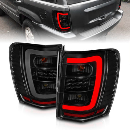 ANZO 1999 - 2004 Jeep Grand Cherokee LED Tail Lights w/ Light Bar Black Housing Smoke Lens - CPC Performance