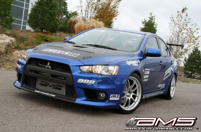 AMS Performance 08 - 15 Mitsubishi EVO X Front Mount Intercooler w/Modular Cast End Tanks & Logo - CPC Performance